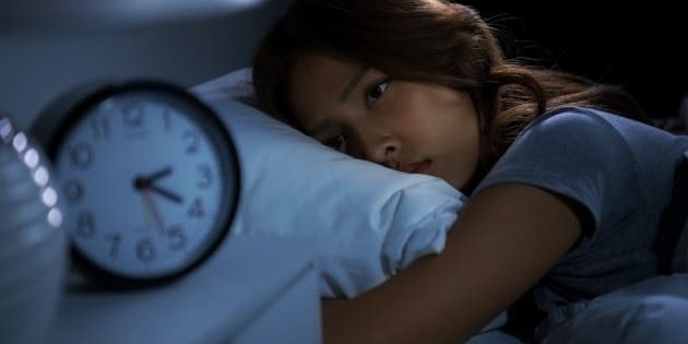 mulher com insônia